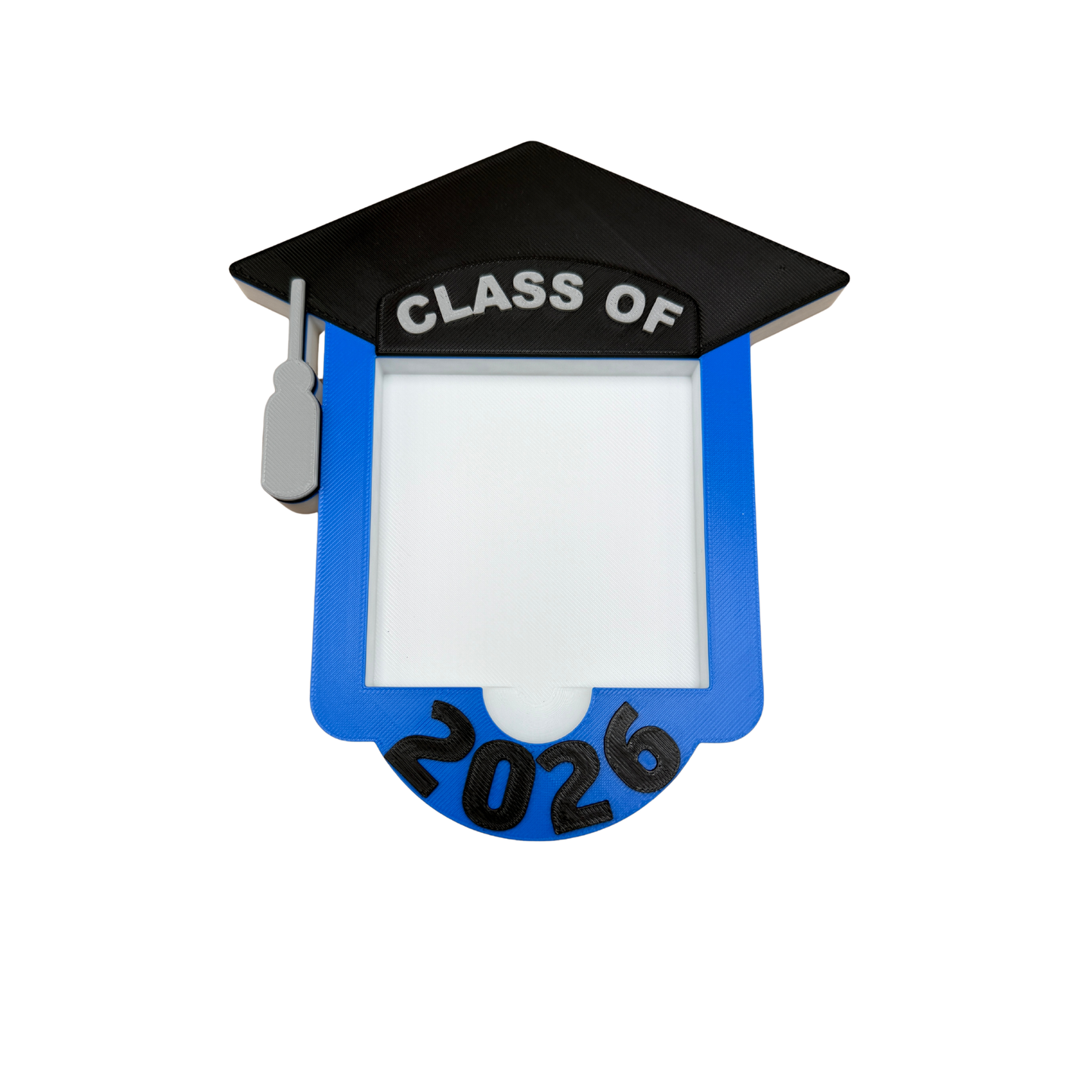 Class of 2026 sticky note holder with 3x3 sticky notes loaded, shown on desk