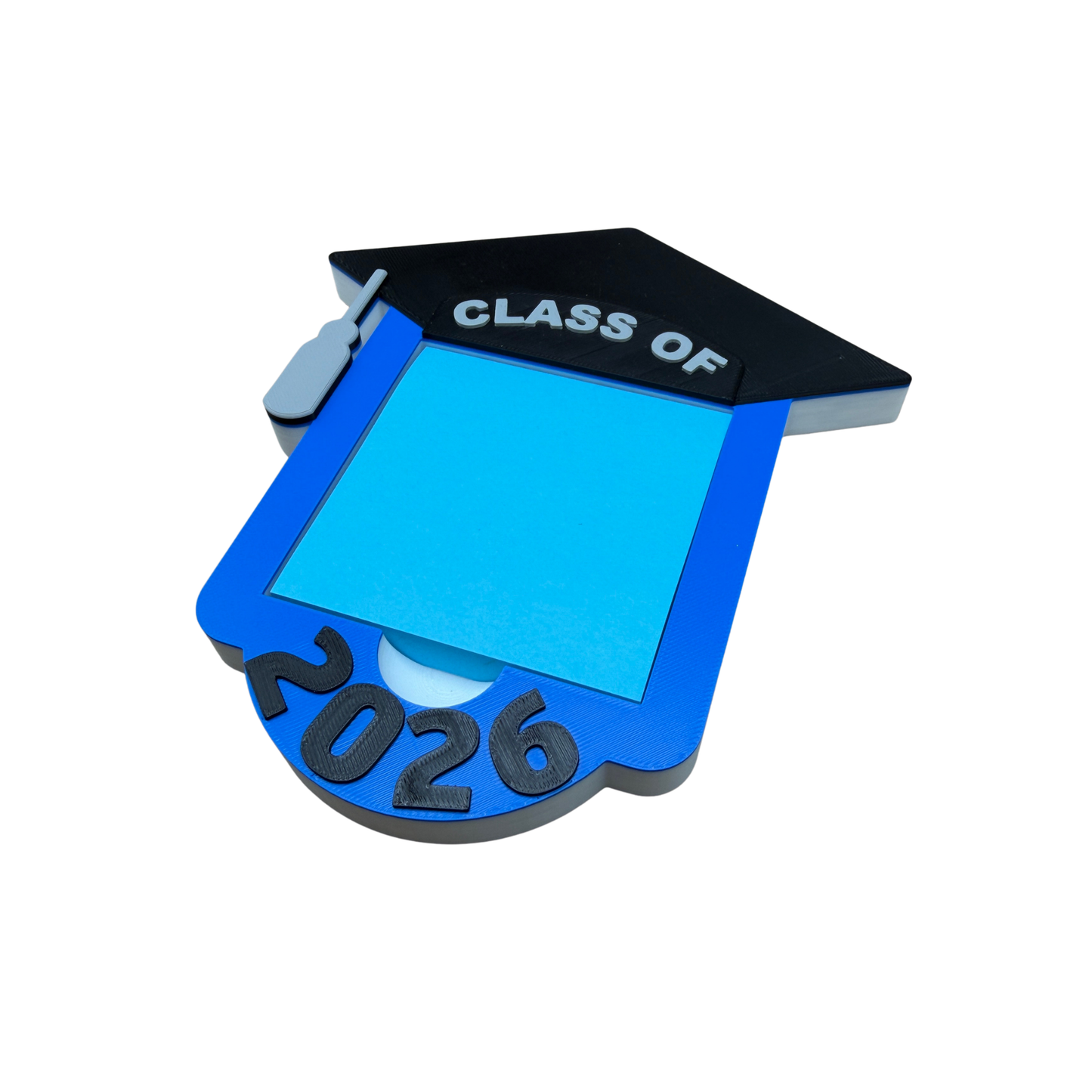 3D printed graduation sticky note holder showing layered construction and tassel detail