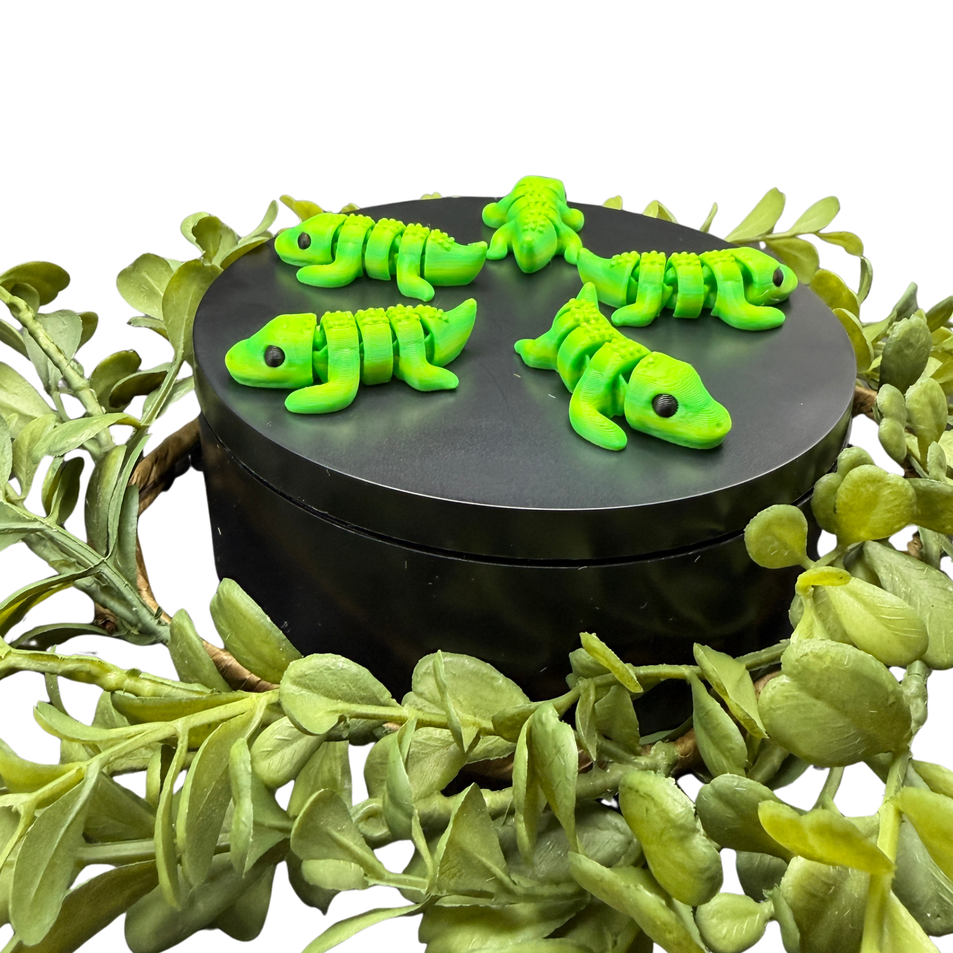 mini crocodile fidget toy in hand showing small size