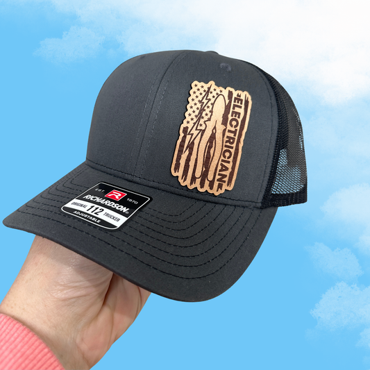 Electrician leather patch trucker hat charcoal black mesh Richardson 112 American flag engraved