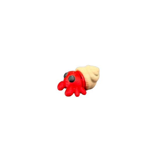3D printed articulated hermit crab fidget toy front view with red body and tan shell