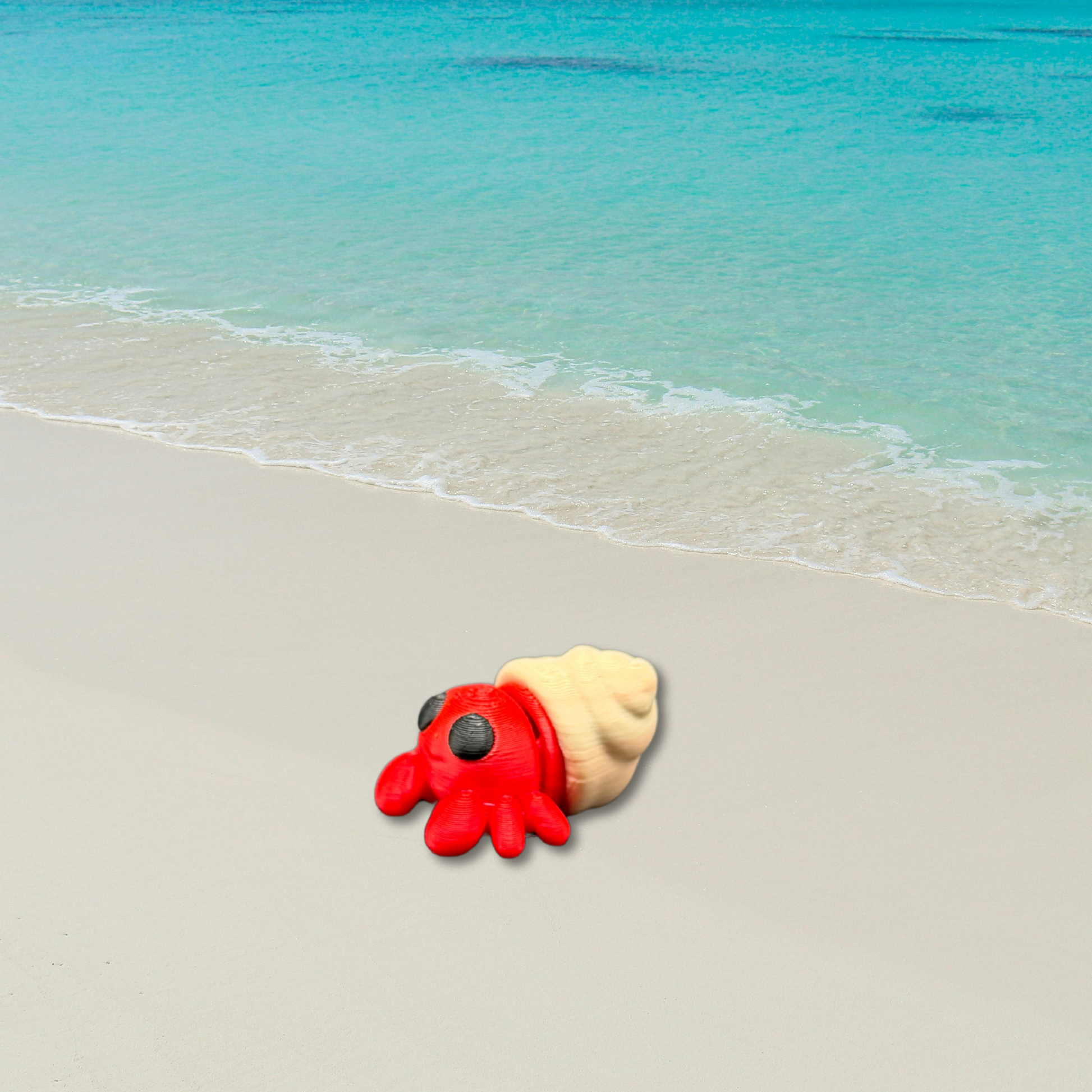 3D printed articulated hermit crab fidget toy front view with red body and tan shell