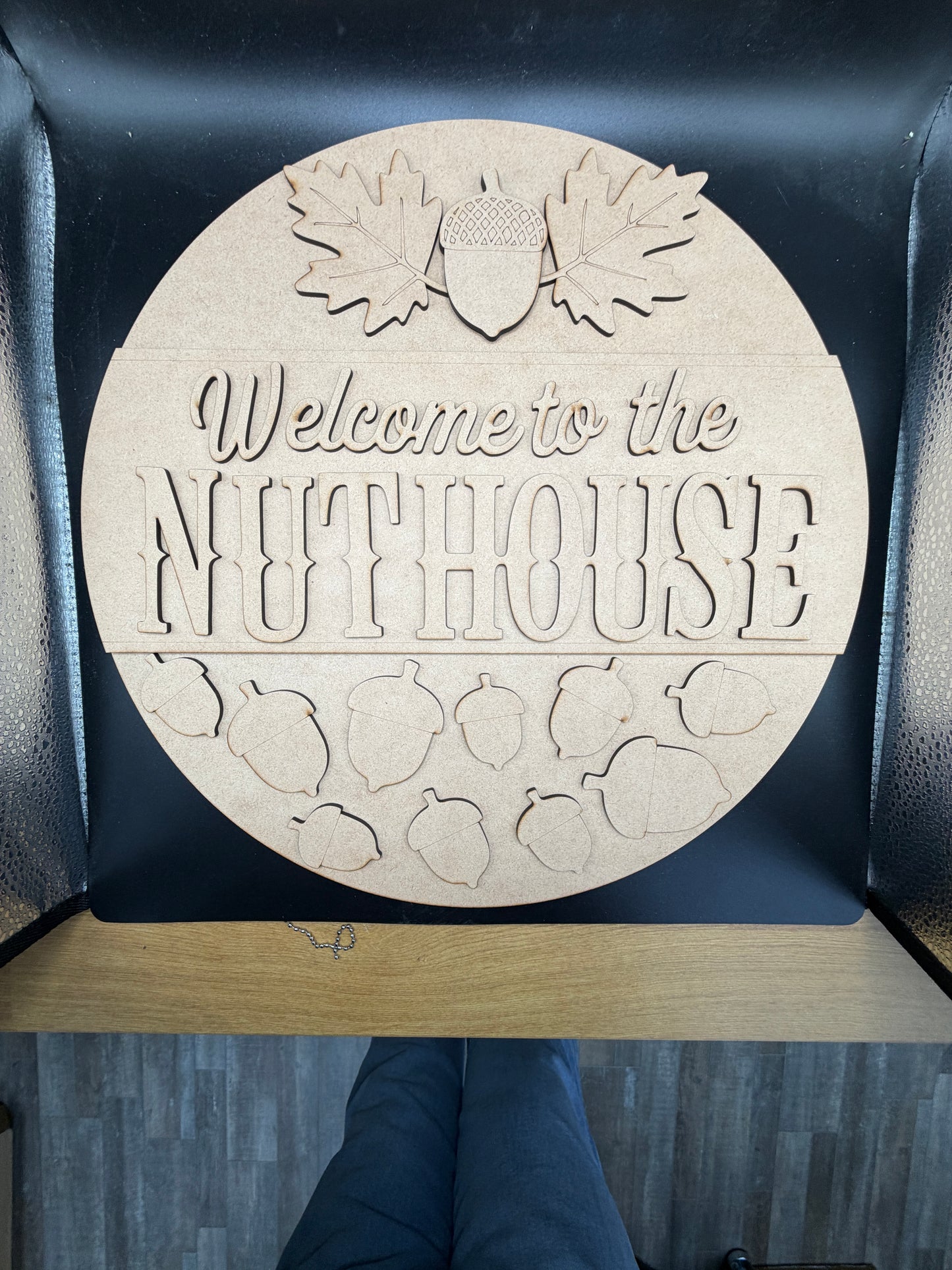 Welcome to the Nuthouse Round Sign