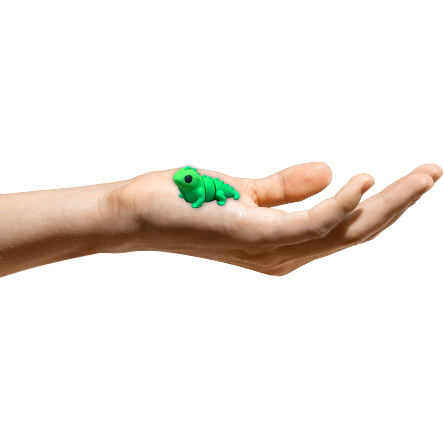 Pocket-sized 3D printed iguana desk pet posed in resting position on a surface