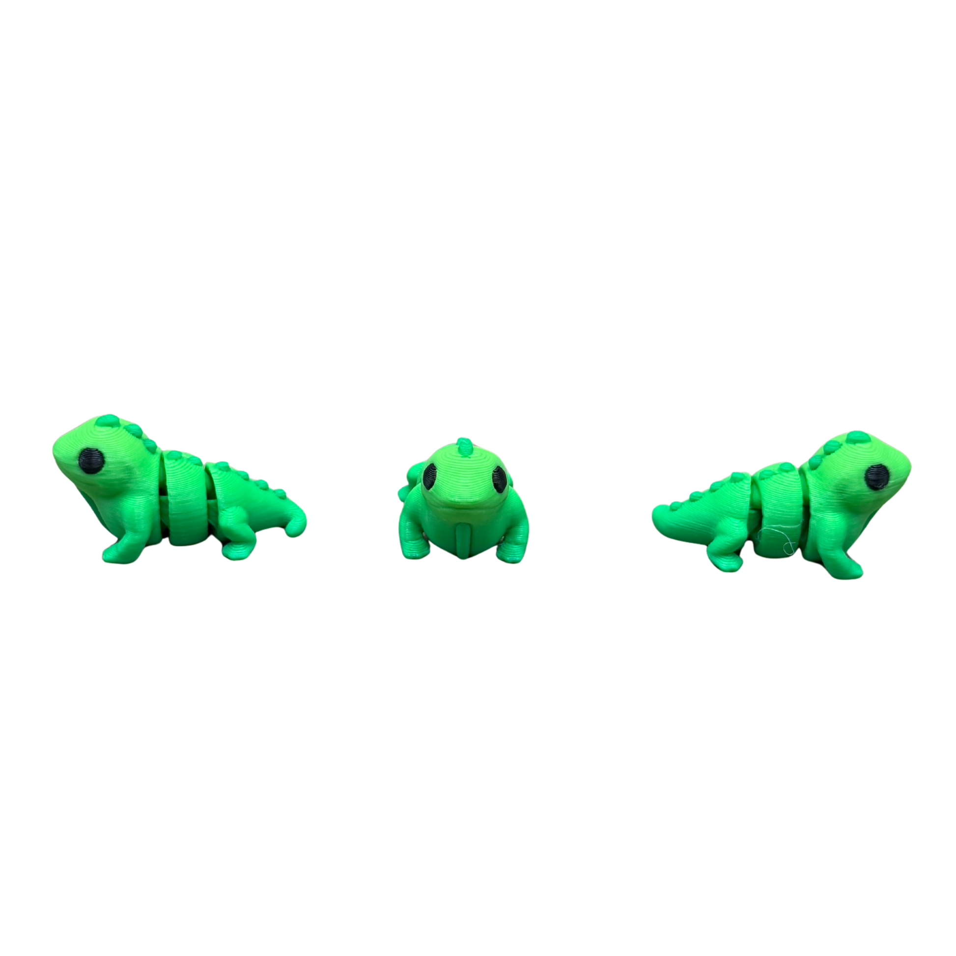 Mini flexi iguana reptile toy showing articulated joint segments from above