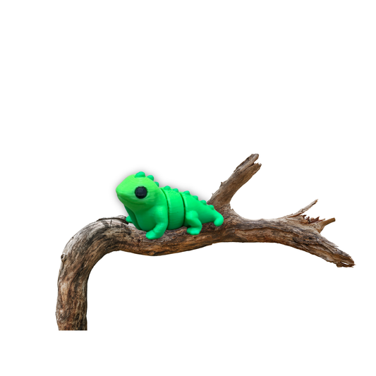 3D printed articulated iguana fidget toy in bright green shown from the side