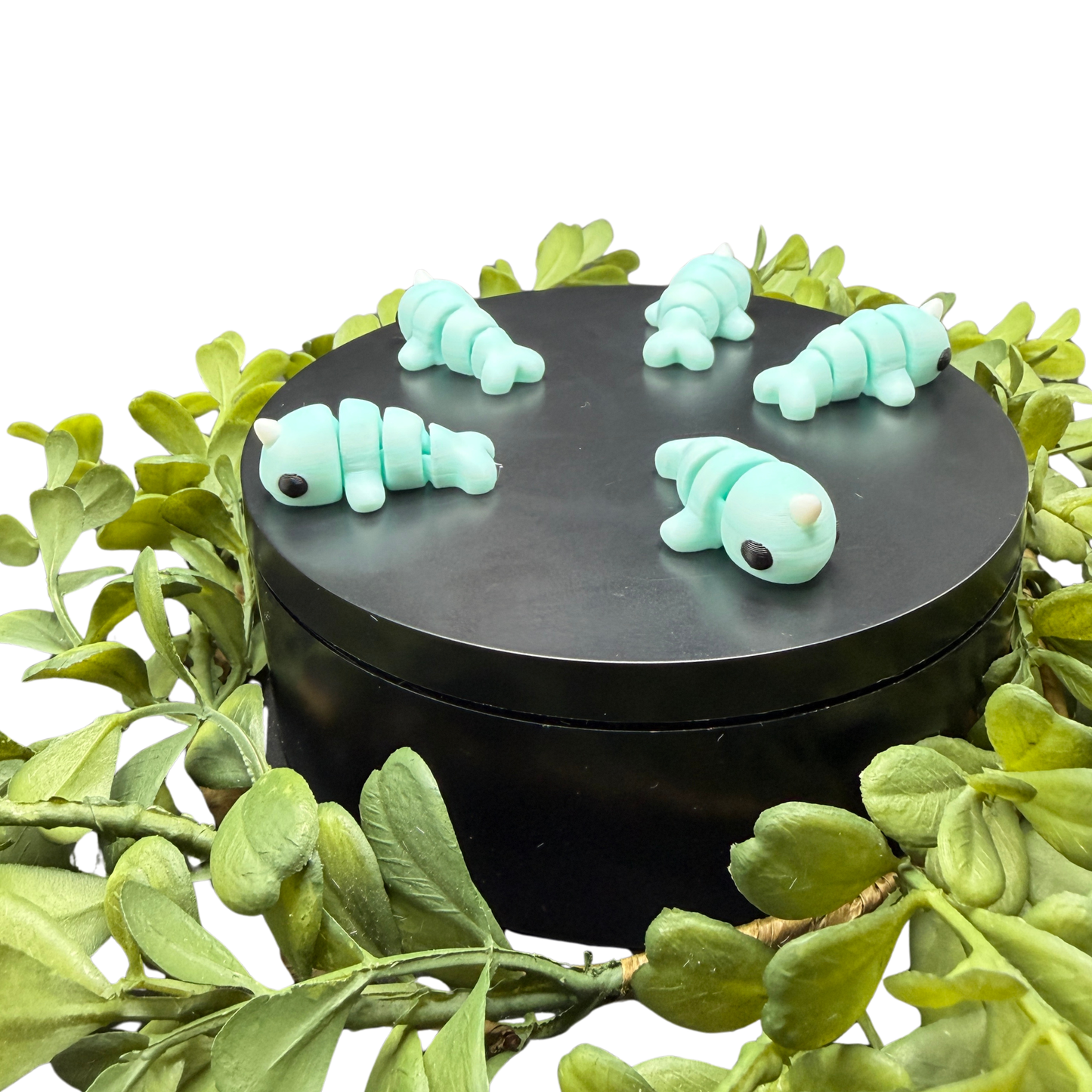 3d printed mini narwhal fidget toy side view