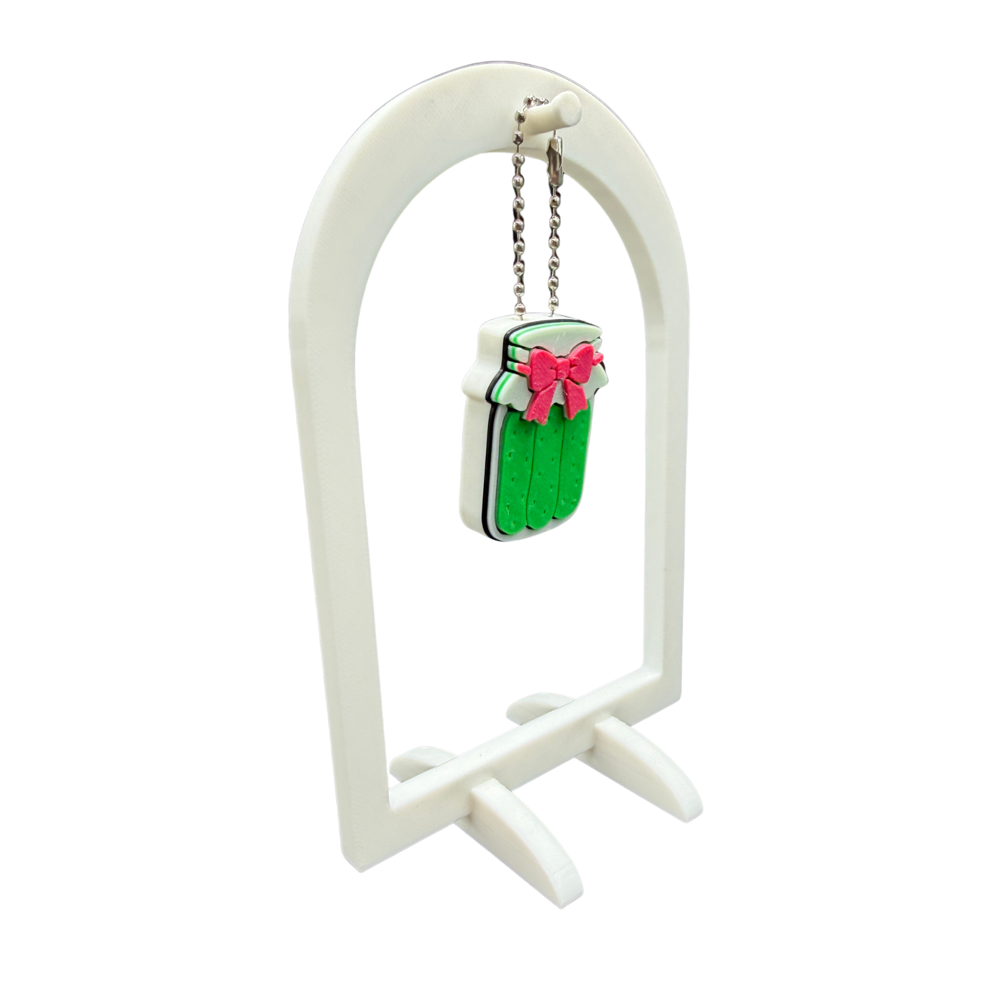 Pickle jar with bow can opener keychain