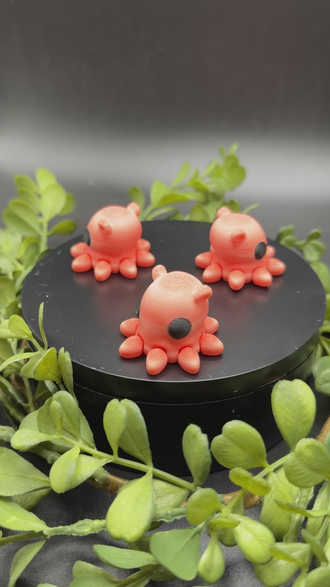 cute mini octopus fidget toy in hand showing size