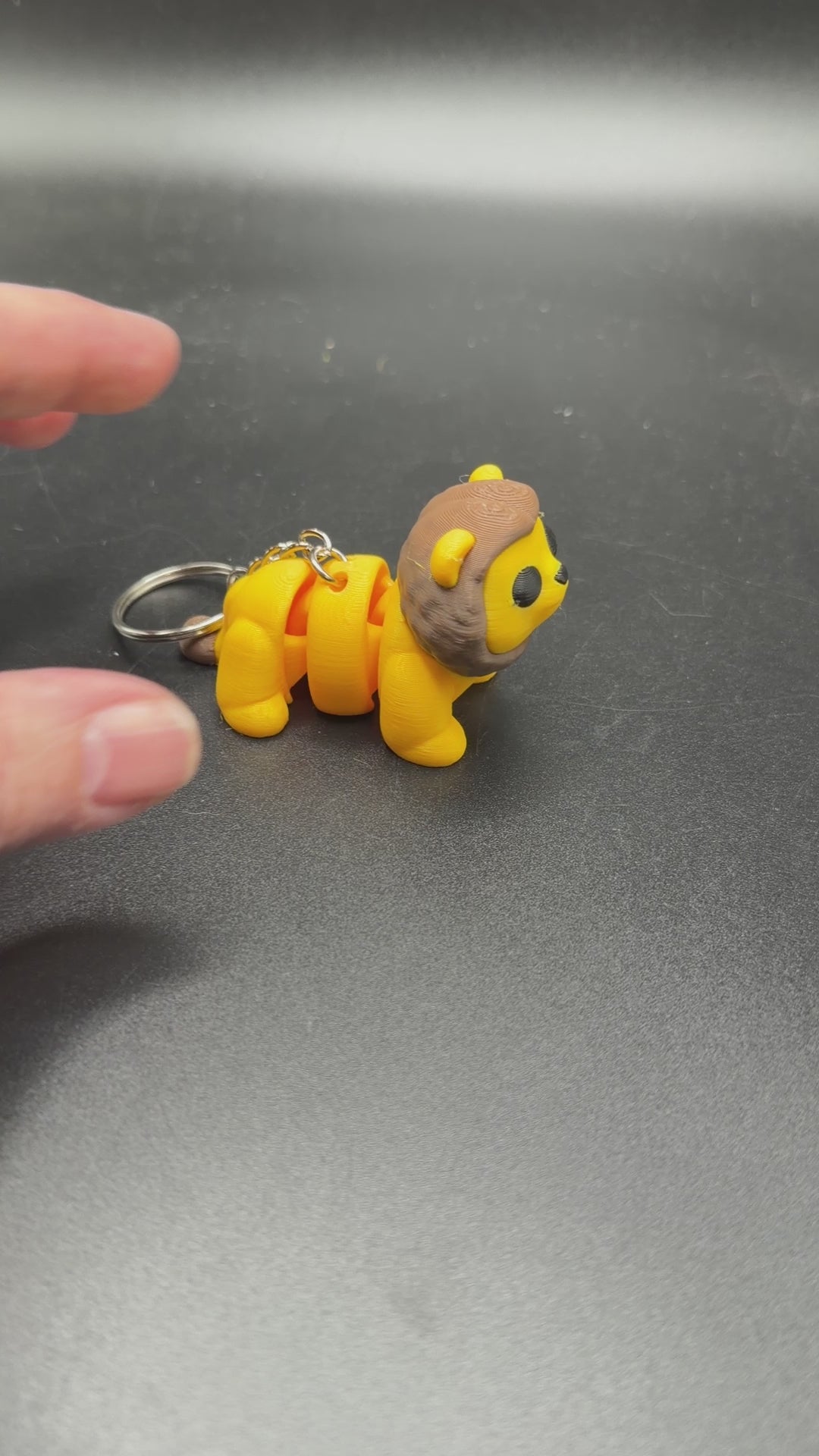 Portable lion fidget keychain backpack charm toy